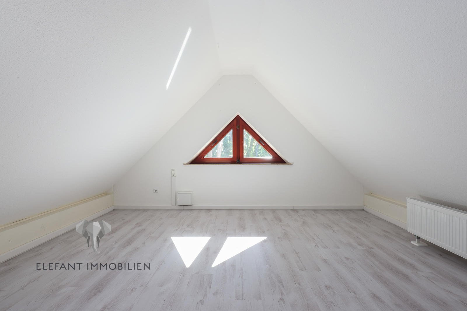 Zimmer im Spitzboden